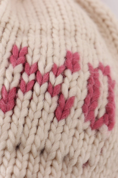 Cream XOXO knit beanie pom pom hat
