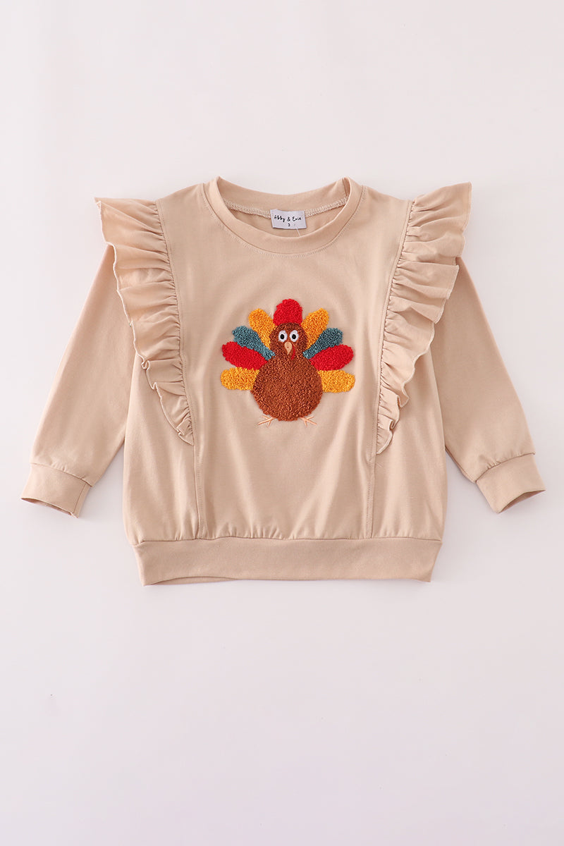Beige turkey french knot ruffle top