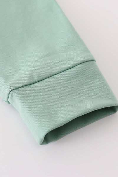 Sage pumpkin french knot ruffle top