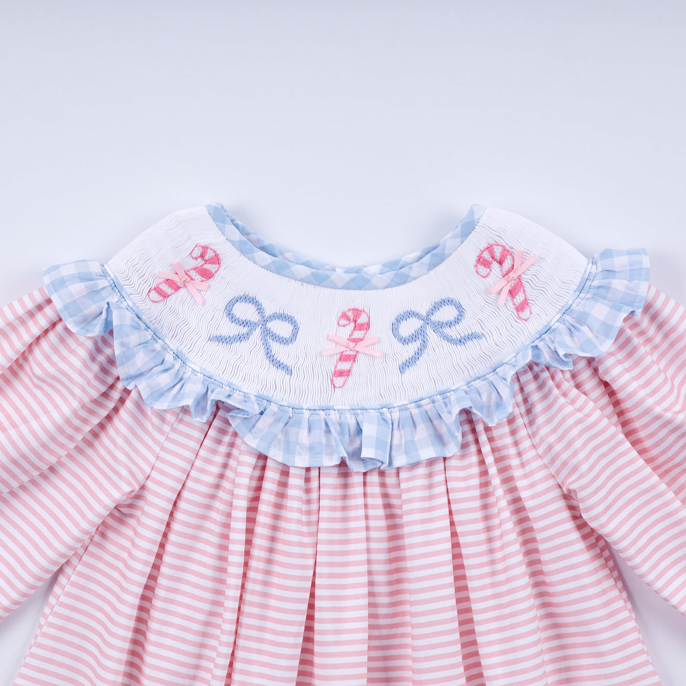 Pink candy cane bow hand smocked ruffle dress