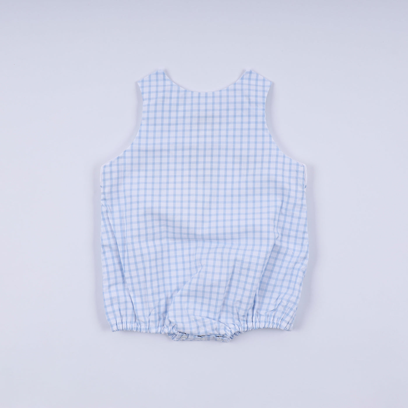Blue character hand smocked gingham bubble
