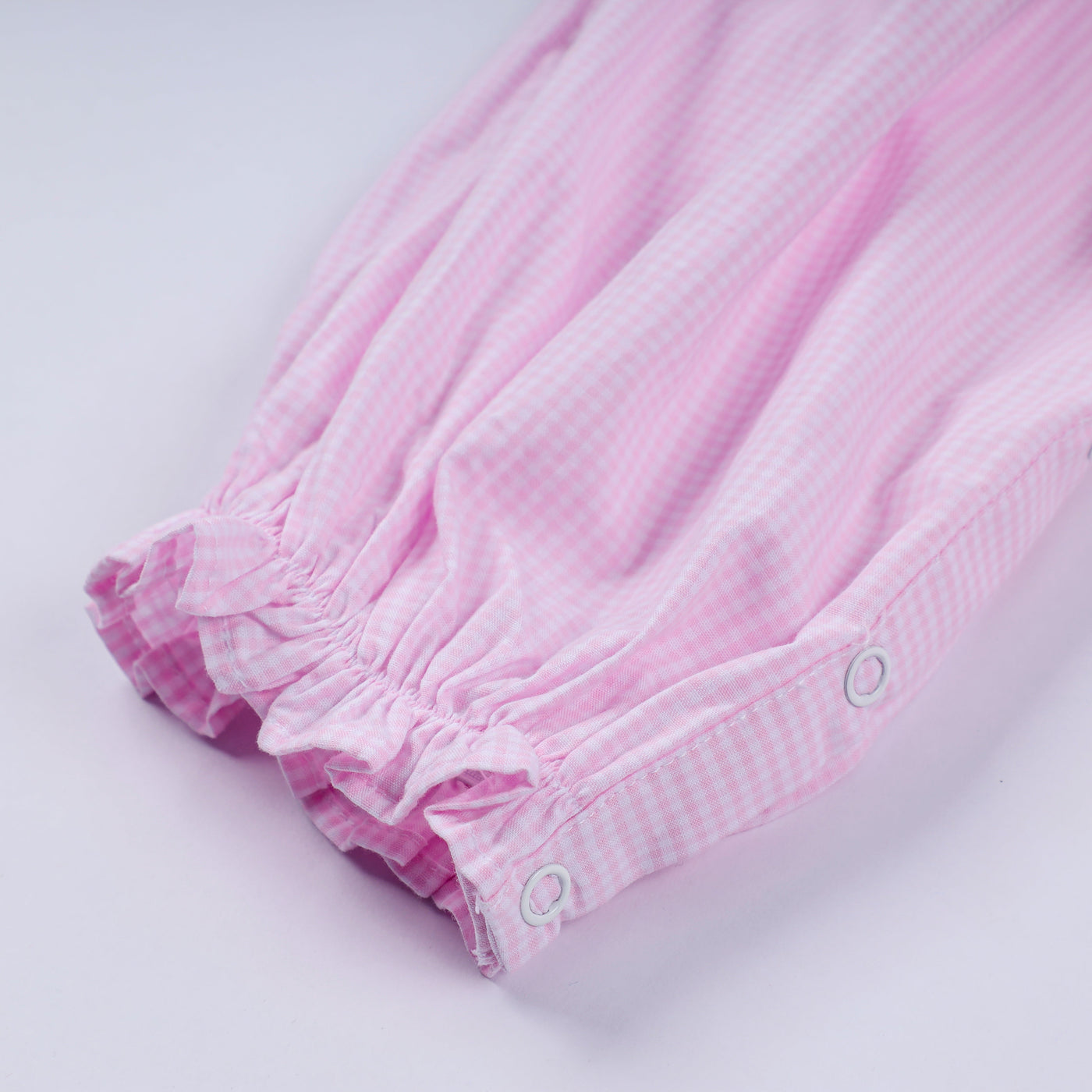 Pink christmas tree hand smocked ruffle romper