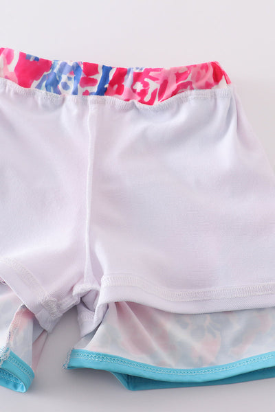 Tropical Sunset Waves swim trunks